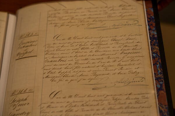 A ledger with ornate writing.